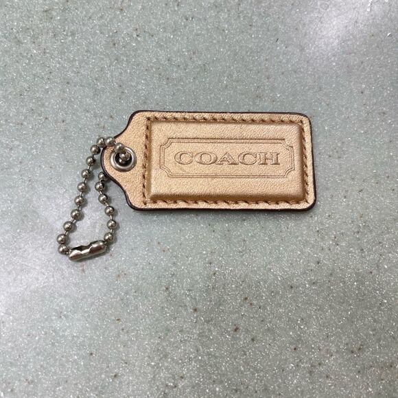 Metallic gold Coach Stamped Leather Hang Tag - Picture 1 of 1